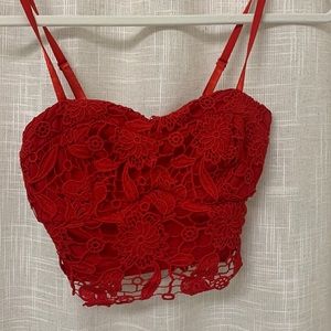 Charlotte Russe red floral zip up crop top